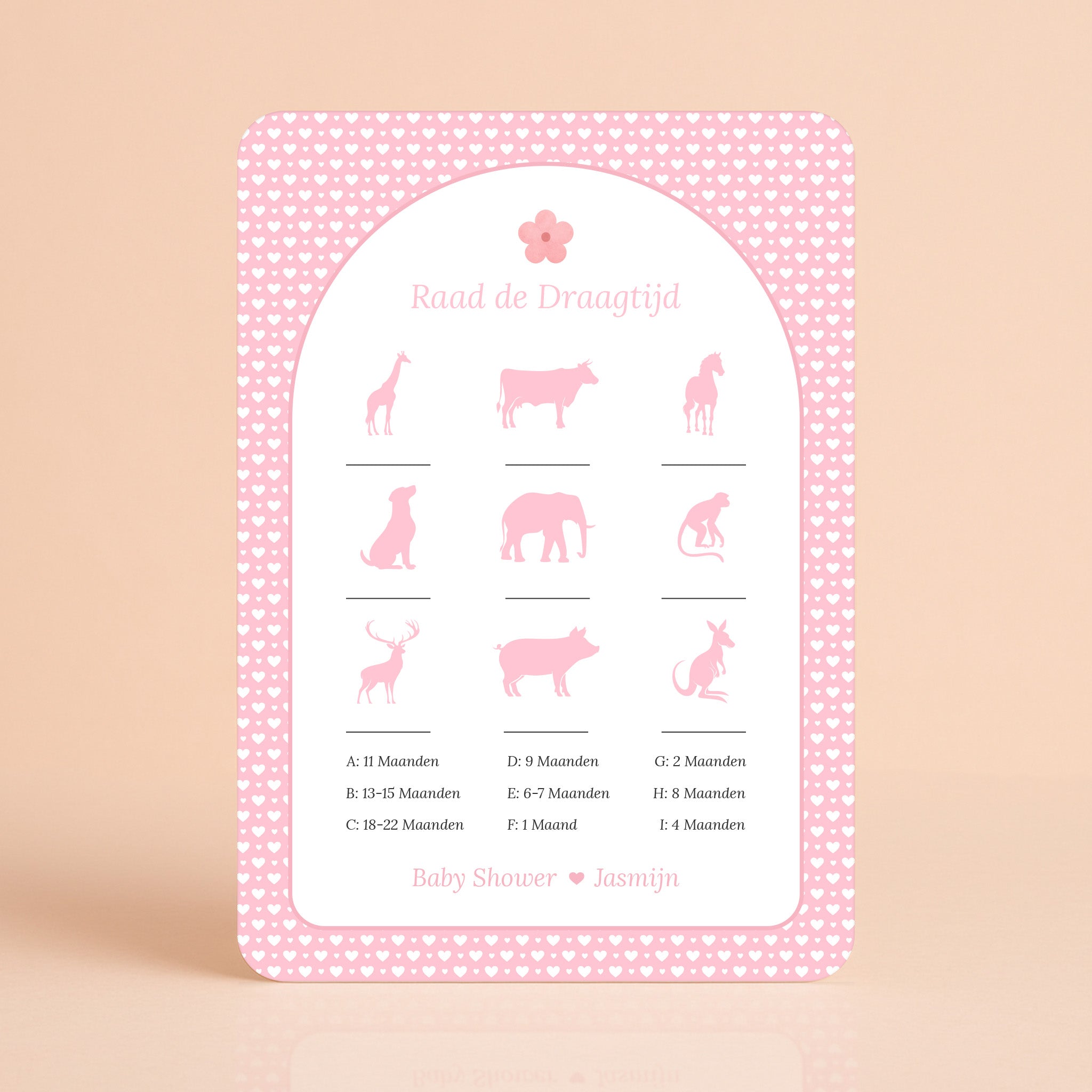 Raad de Draagtijd kaart met witte hartjes op roze achtergrond en bloemaccent, gepersonaliseerd met naam – Studio Miron